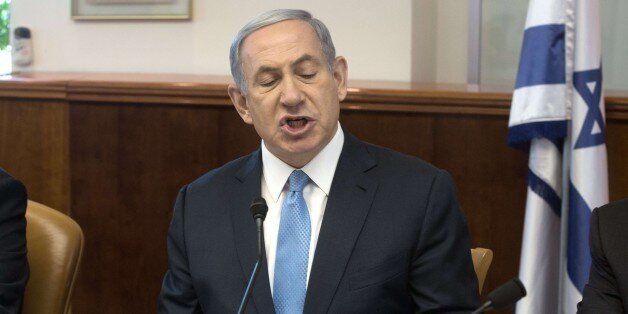 Israeli Prime Minister Benjamin Netanyahu gestures as he chairs the weekly cabinet meeting in Jerusalem on May 31, 2015. AFP PHOTO / POOL / MENAHEM KAHANA (Photo credit should read MENAHEM KAHANA/AFP/Getty Images)