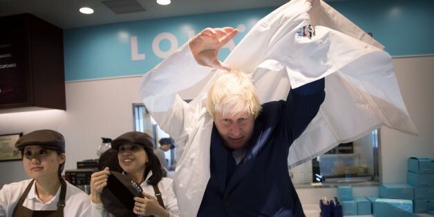Mayor of London Boris Johnson visits the British firm, Lola's Cupcakes during his visit to Tokyo. The mayor is on the third day of a four day trade visit to Japan.