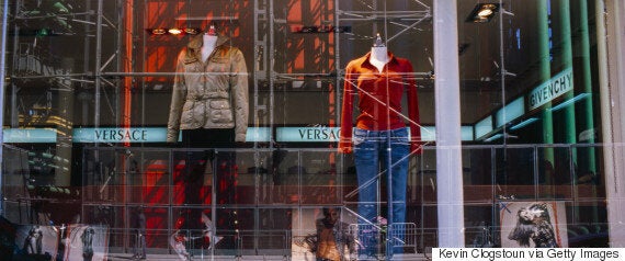 Givenchy Window display, Avenue Montaigne, Paris - people walk in