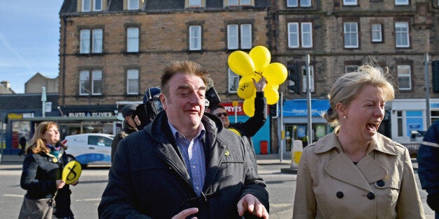 EDINBURGH, SCOTLAND - APRIL 02: SNP General Election candidate for Edinburgh East Tommy Sheppard is joined by Scotland's Health Secretary Shona Robertson during campaigning on April 2, 2015 in Portobello, Scotland. Tonight will see a televised leaders election debate with seven political parties, including Prime Minister David Cameron, Deputy Prime Minister Nick Clegg, Labour party leader Ed Miliband, UKIP's Nigel Farage and the leaders of the Green Party, Plaid Cymru and SNP leader Nicola Sturgeon. The debate will be the only time that David Cameron and Ed Miliband will face each other before polling day on May 7th. (Photo by Jeff J Mitchell/Getty Images)