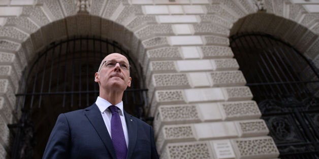 Scotland's Deputy First Minister John Swinney speaks to the media in Westminster, London, after meeting with Chancellor George Osborne where he put forward the Scottish government's alternative plan to austerity.