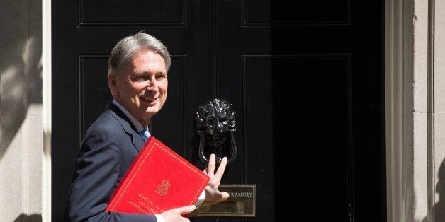 British Foreign Secretary Philip Hammond arrives for the first weekly cabinet meeting in Downing Street, central London, on May 12, 2015, following the May 7 general election. British Prime Minister David Cameron unveiled his new cabinet after an unexpected election victory that gave his Conservative party an outright majority in parliament for the first time in nearly 20 years. AFP PHOTO / LEON NEAL (Photo credit should read LEON NEAL,LEON NEAL/AFP/Getty Images)