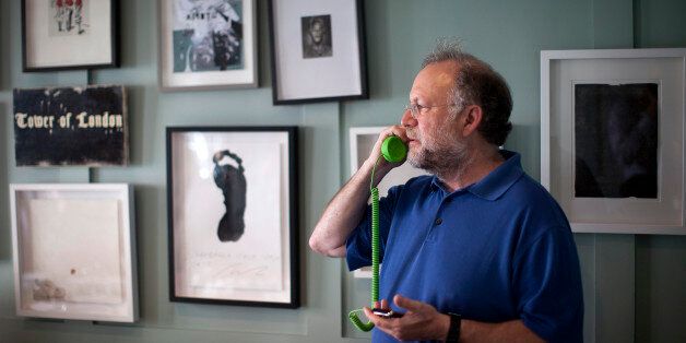 Jerry Greenfield, co-founder of Ben & Jerry's Homemade Inc. ice creams, speaks on his mobile phone in London, U.K., on Tuesday, May 22, 2012. Unilever NV, parent of Ben & Jerry's, said costs for raw materials in 2012 will be 'slightly higher' than the mid-single-digit increase the company forecast in February, citing high prices for crude oil and vegetable oils. Photographer: Simon Dawson/Bloomberg via Getty Images