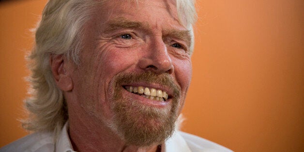 Richard Branson, chairman and founder of Virgin Group Ltd., smiles during a Bloomberg Television interview in San Francisco, California, U.S., on Thursday, April 23, 2015. Branson and Facebook Inc. Chief Operating Officer Sheryl Sandberg's interview comes on the sidelines of the Virgin Disruptors conference which focuses on employee wellbeing.