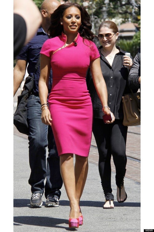 mel b pink dress Mel B flashes a smile in skintight pink outfit after ex-husband Stephen  Belafonte claims she had a cocaine addiction