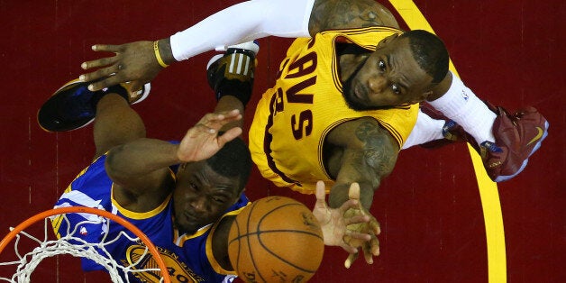 CLEVELAND, OH - JUNE 11: LeBron James #23 of the Cleveland Cavaliers goes up against Harrison Barnes #40 of the Golden State Warriors in the second half during Game Four of the 2015 NBA Finals at Quicken Loans Arena on June 11, 2015 in Cleveland, Ohio. NOTE TO USER: User expressly acknowledges and agrees that, by downloading and or using this photograph, user is consenting to the terms and conditions of Getty Images License Agreement. (Photo by Ronald Martinez/Getty Images)