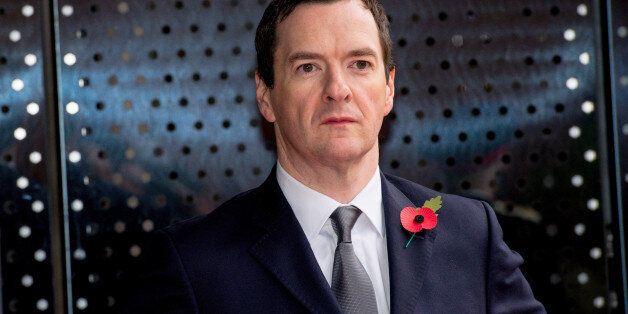 MANCHESTER, ENGLAND - OCTOBER 23: Chancellor of the Exchequer George Osborne waits for The President of the People's Republic of China Xi Jinping to arrive to tour the National Graphene Institute at Manchester University with the Chancellor of the Exchequer George Osborne on October 23, 2015 in Manchester, England. After listening to a presentation from Dame Nancy Rothwell, the party toured the University Centre which leads the world in graphene research and is one of the most important centres for commercialising the one-atom-thick material. (Photo by Richard Stonehouse - WPA Pool/Getty Images)