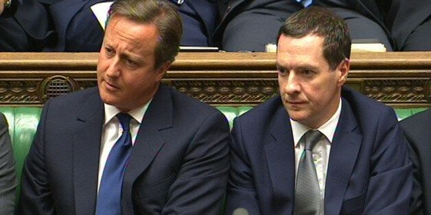 Prime Minister David Cameron and Chancellor George Osborne during Prime Minister's Questions in the House of Commons, London.