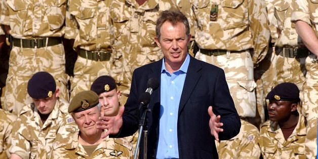File photo dated 04/01/04 of Tony Blair addressing British troops on a visit to Basra, Iraq. Saddam Hussein would have acted like Syrian leader Bashar Assad and brutally turned on his own people if the US-led coalition had not removed him from power, Mr Blair has claimed.