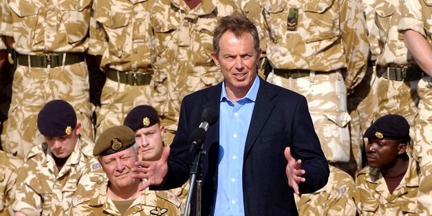 File photo dated 04/01/04 of Tony Blair addressing British troops on a visit to Basra, Iraq, as the long-awaited report into the Iraq war should finally be ready for publication by July next year, Sir John Chilcot has said.