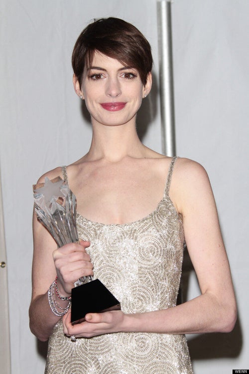 anne hathaway silver dress Les Freezing! Anne Hathaway stunning in backless gown at Les Mis premiere  in Leicester Square | London Evening Standard