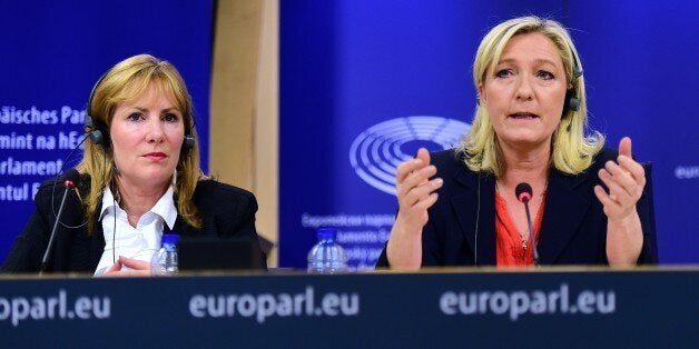 France's far-right National Front (FN) party leader Marine Le Pen (R) holds a press conference at the European Parliament in Brussels, on June 16, 2015, with European Parliament member Janice Atkinson of the UK to announce a new grouping of European far-right parties, called Europe of Nations and Freedom. AFP PHOTO / EMMANUEL DUNAND (Photo credit should read EMMANUEL DUNAND/AFP/Getty Images)