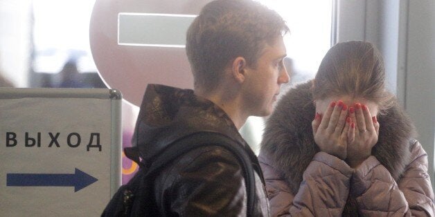 SAINT PETERSBURG, RUSSIA - OCTOBER 31: Relatives of passengers of Russian Airbus-321 aircraft react at Pulkovo international airport in Saint Petersburg, Russia on October 31, 2015. A Russian Airbus-321 aircraft with 224 people aboard crashed in Egypt's Sinai Peninsula on Saturday, according to the Egyptian Prime Minister's office. According to Egypts Civil Aviation Authority, the plane lost contact with air-traffic controllers shortly after taking off from the Egyptian Red Sea resort city of S