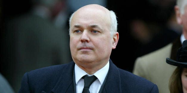 London, UNITED KINGDOM: Former Conservative Party leader Ian Duncan Smith (L) attends the funeral of ex-British Cabinet Minister John Profumo at St. Paul's Church in Knightsbridge, in London, 20 March 2006. John Profumo, the British war minister caught in a sex and spy tangle at the height of the Cold War died aged 91, reviving old memories of a scandal that shook the establishment to the core and helped bring down the government. The scandal had all the players and ingredients of a period drama, with a ravishing young call girl, a dapper cabinet minister, a Russian agent, tales of orgies, and even gunshots fired into the night by a jealous lover. His downfall began in July 1961, when as a 48-year-old secretary of state for war in Prime Minister Harold Macmillan's government, Profumo fell for Christine Keeler, a 19-year-old prostitute. AFP PHOTO/BEN STANSALL (Photo credit should read BEN STANSALL/AFP/Getty Images)