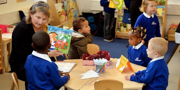 Children and a teacher at the Windrush Nursery in Greenwich, south east London.