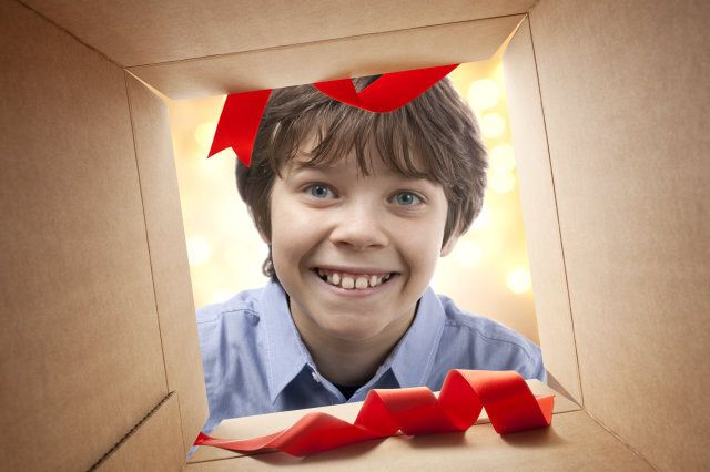 Christmas gift. View of a child from inside a cardboard box.Similar photographs from my portfolio: