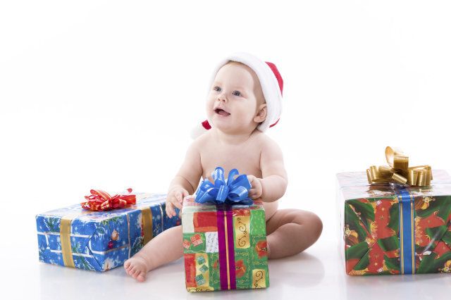 smiling baby in a cap of santa...