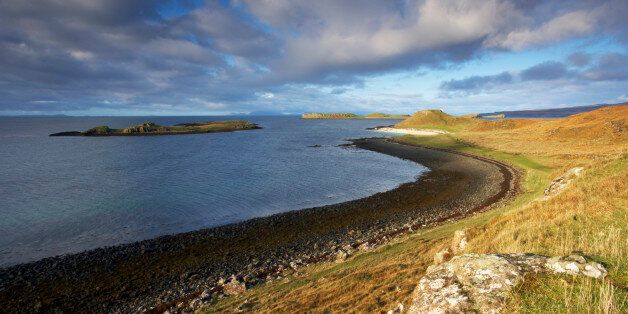 Coral beaches on the Isle of Skye near Dunvegan with the islands of Lewis and Harris in the distance, Scotland