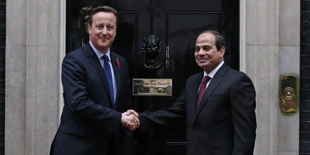 British Prime Minister David Cameron (L) shakes hands with Egyptian President Abdel Fattah al-Sisi (R) as he welcomes him to 10 Downing Street in central London on November 5, 2015. Sisi held talks with Cameron on November 5 on security and the Sinai plane crash, as concerns mount it could have been caused by a bomb. AFP PHOTO / ADRIAN DENNIS (Photo credit should read ADRIAN DENNIS/AFP/Getty Images)