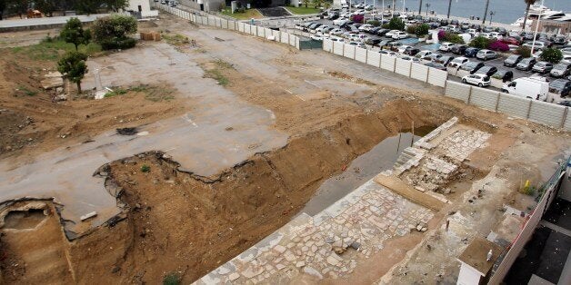 TO GO WITH AFP STORY by Pierre LANFRANCHIPhoto taken on June 18, 2014 shows a car park construction site in Ajaccio, on the French Mediterranean island of Corsica. The construction of the car park has been stopped by the discovery of a Napoleonic quay below ground. AFP PHOTO / PASCAL POCHARD-CASABIANCA (Photo credit should read PASCAL POCHARD-CASABIANCA/AFP/Getty Images)