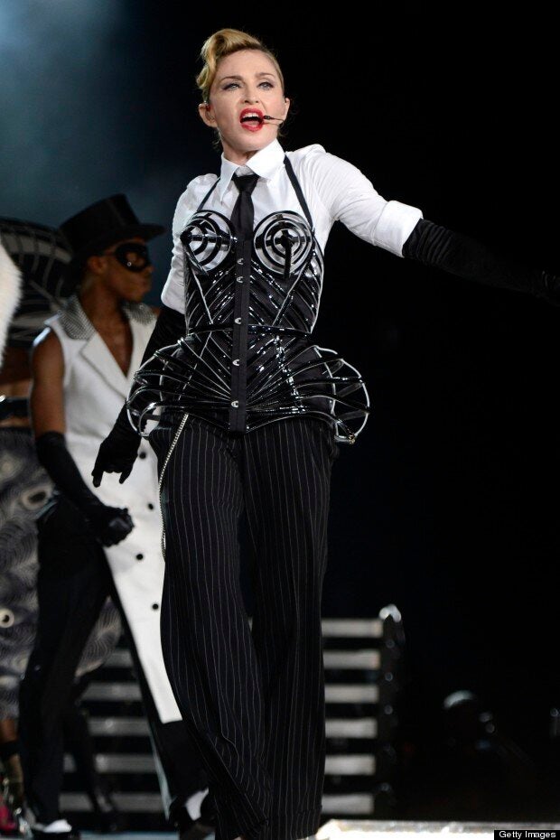 Madonna Brings Back The Cone Bra, Dresses As A Cheerleader For MDNA