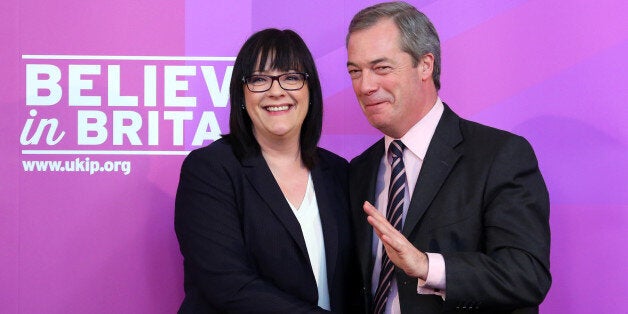 Ukip health spokesman Louise Bours MEP (left) is congratulated by party leader Nigel Farage after delivering a speech at Rochester Corn Exchange in Kent, after Mr Farage insisted that the NHS will be completely free at the point of access for British citizens as he outlined Ukip's plan to invest an extra 3 billion a year in the health service.