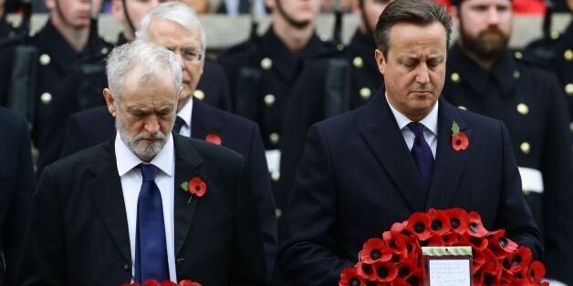 Labour party leader Jeremy Corbyn (left) and Prime Minister David Cameron wait to lay wreaths during the annual Remembrance Sunday service at the Cenotaph memorial in Whitehall, central London, held in tribute for members of the armed forces who have died in major conflicts.