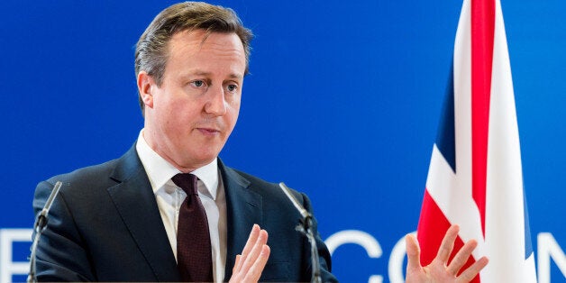 British Prime Minister David Cameron addresses the media after an EU summit in Brussels on Friday, March 20, 2015. EU leaders on Friday are looking to back U.N.-brokered efforts to form a national unity government in conflict-torn Libya that may include a possible mission to help provide security. (AP Photo/Geert Vanden Wijngaert)