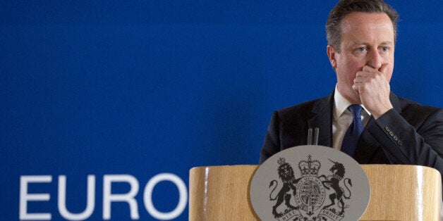 British Prime Minister David Cameron pauses before speaking during a final media conference after an EU summit in Brussels on Friday, June 26, 2015. EU leaders, in a second day of meetings, discussed migration, the Greek bailout and European defense. (AP Photo/Virginia Mayo)