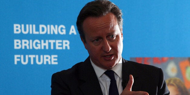 Prime Minister David Cameron talks to students in Runcorn, where he signalled the Government wants a new definition of child poverty