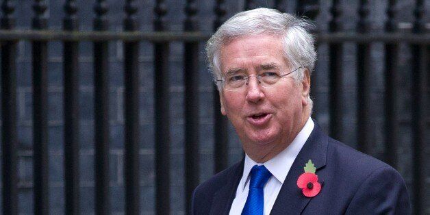 British Defence Secretary Michael Fallon arrives for the weekly cabinet meeting at 10 Downing Street in London on October 27, 2015. Britain will keep its current level of 450 troops on non-combat missions in Afghanistan into 2016, Defence Secretary Michael Fallon said in a written statement to parliament on October 27. AFP PHOTO / JUSTIN TALLIS (Photo credit should read JUSTIN TALLIS/AFP/Getty Images)
