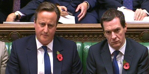 Prime Minister David Cameron and Chancellor George Osborne during Prime Minister's Questions in the House of Commons, London.