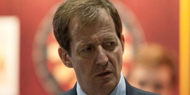 Alastair Campbell, former Director of Communications and Strategy for ex Prime Minister Tony Blair, is seen by the conference hall on the first day of Britain's Conservative Party Conference, Manchester, England, Sunday, Sept. 29, 2013. (AP Photo/Jon Super)