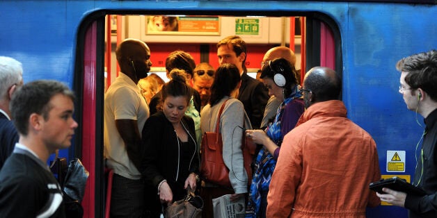 File photo dated 15/09/2014 of commuters making their way off a train at Blackfriars Station, London as more than a quarter of commuters on London-bound morning rush hour trains have to stand due to packed carriages, new figures show.