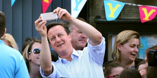 Prime Minister David Cameron takes a selfie the Tour de Yorkshire cycle race passes through Addingham in West Yorkshire.