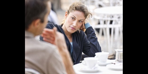 Couple Talking at a Cafe