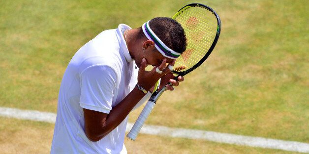 Nick Kyrgios shows his frustration during his match against Milos Raonic during day Five of the Wimbledon Championships at the All England Lawn Tennis and Croquet Club, Wimbledon.