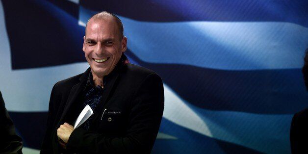Greece's new Finance minister Yanis Varoufakis smiles after a ministry hand-over ceremony in Athens on January 28, 2015. Varoufakis said today he wants to see a pan-European deal to encourage growth. The new anti-austerity Syriza-led government wants 'a pan-European +New Deal+ that will lead Europe to a reboot', Varoufakis told journalist. AFP PHOTO / ARIS MESSINIS (Photo credit should read ARIS MESSINIS/AFP/Getty Images)