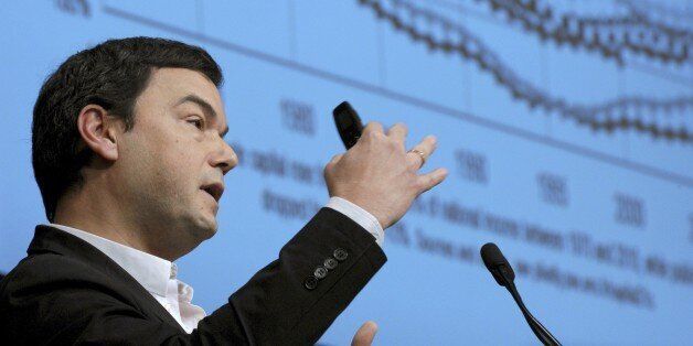France's influential economist Thomas Piketty, author of the bestseller 'Capital in the 21st Century' addresses a keynote speech during a symposium Les Entretiens du Tresor at the Economy Ministry in Paris on January 23, 2015. AFP PHOTO / ERIC PIERMONT (Photo credit should read ERIC PIERMONT/AFP/Getty Images)
