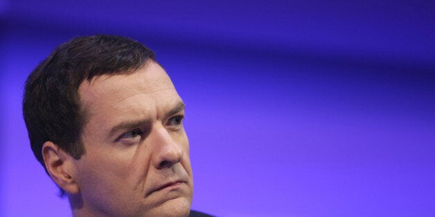 George Osborne, U.K. chancellor of the exchequer, pauses during the Institute of Directors (IOD) annual convention at the Royal Albert Hall in London, U.K., on Friday, Oct. 3, 2014. Osborne told the IOD 'clearly the economy is growing, unemployment has fallen sharply and business investment has picked up,'. Photographer: Chris Ratcliffe/Bloomberg via Getty Images