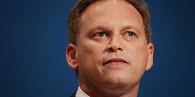 Party chairman Grant Shapps (C) addresses delegates at the Conservative party conference on September 28, 2014 in Birmingham, England. The governing Conservative party are holding their yearly conference over the next four days. (Photo by Peter Macdiarmid/Getty Images)