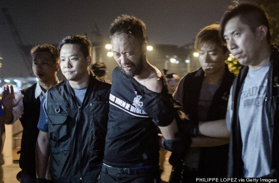 Hong Kong Police 'Kick And Punch Handcuffed Protestor' In Dark Corner ...