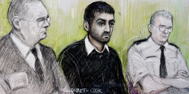 Court artist sketch by Elizabeth Cook of Erol Incedal (centre),formerly known in the case as AB, appearing at the Old Bailey accused of preparing acts of terrorism and possessing a document entitled Bomb Making, the case is the first major terror trial in the UK to be heard almost entirely in secret.