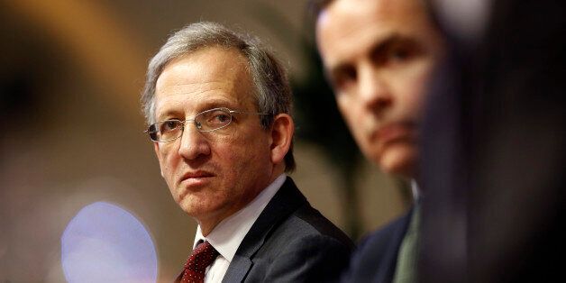Jon Cunliffe, deputy governor for financial stability at the Bank of England, left, sits with Mark Carney, governor of the Bank of England, during the bank's financial stability report news conference at the Bank of England in London, U.K., on Thursday, Nov. 28, 2013. Carney this week extolled the strength of the economy's revival, while acknowledging that weak growth in the euro area may weigh on the export outlook and limit rebalancing of the economy. Photographer: Simon Dawson/Bloomberg via G