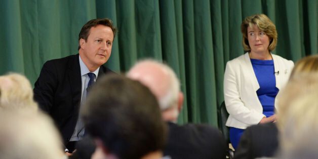 Prime Minister David Cameron at Wainscott Memorial Hall in Rochester with one of the Conservative Party's two applicants, Anna Firth (white jacket), for the nomination of candidate in upcoming Rochester and Strood by-election forced by the defection of Mark Reckless to UKIP last month.