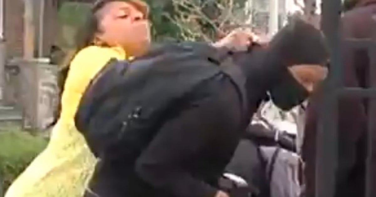 Baltimore Riots Video Captures Mother Marching Mask-Clad Son Home Live ...