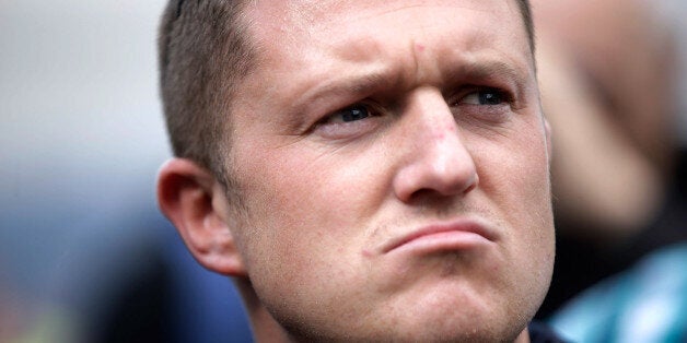 LONDON, ENGLAND - SEPTEMBER 07: Stephen Lennon aka Tommy Robinson, leader of the English Defence League, pauses before a group march to Aldgate by EDL supporters on September 7, 2013 in London, England. The EDL far-right organisation have had restrictions placed on the march by the Metropolitan police due to the fear of 'serious public disorder', but it will still proceed to the edge of Tower Hamlets, which is home to a large population of ethnic minorities. (Photo by Matthew Lloyd/Getty Image