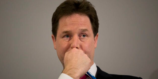 Deputy Prime Minister Nick Clegg listens as he takes questions from journalists after making a speech on immigration in London. Clegg says the government is studying the idea of an immigration insurance plan which would see visitors from 'high risk' countries be forced to put up a cash deposit to come to the country.