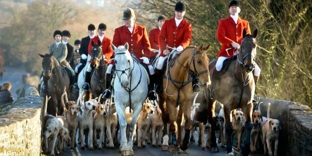 The Avon Vale hunt makes its way to the village of Laycock, Wiltshire on the traditional Boxing Day meet