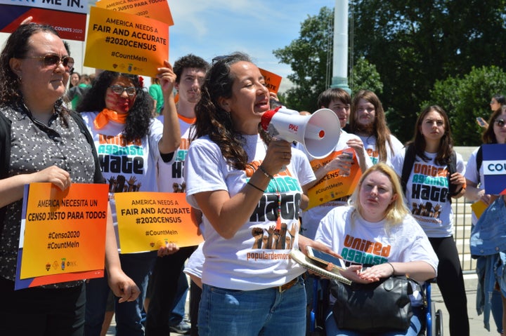 Activists protest the addition of a citizenship question to the 2020 census in front of the Supreme Court.